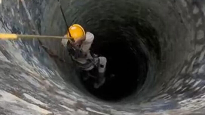 Rescue of cats that fell into a 70-foot deep well